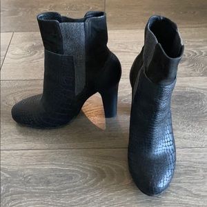 Black high heeled boots